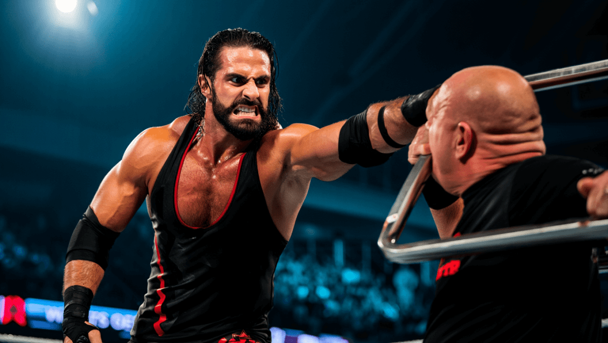 Paul Heyman gets attacked by Seth Rollins on Raw, hospitalized