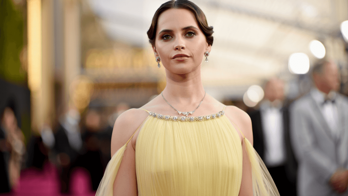 Felicity Jones stuns Oscars red carpet in pale-yellow Prada gown