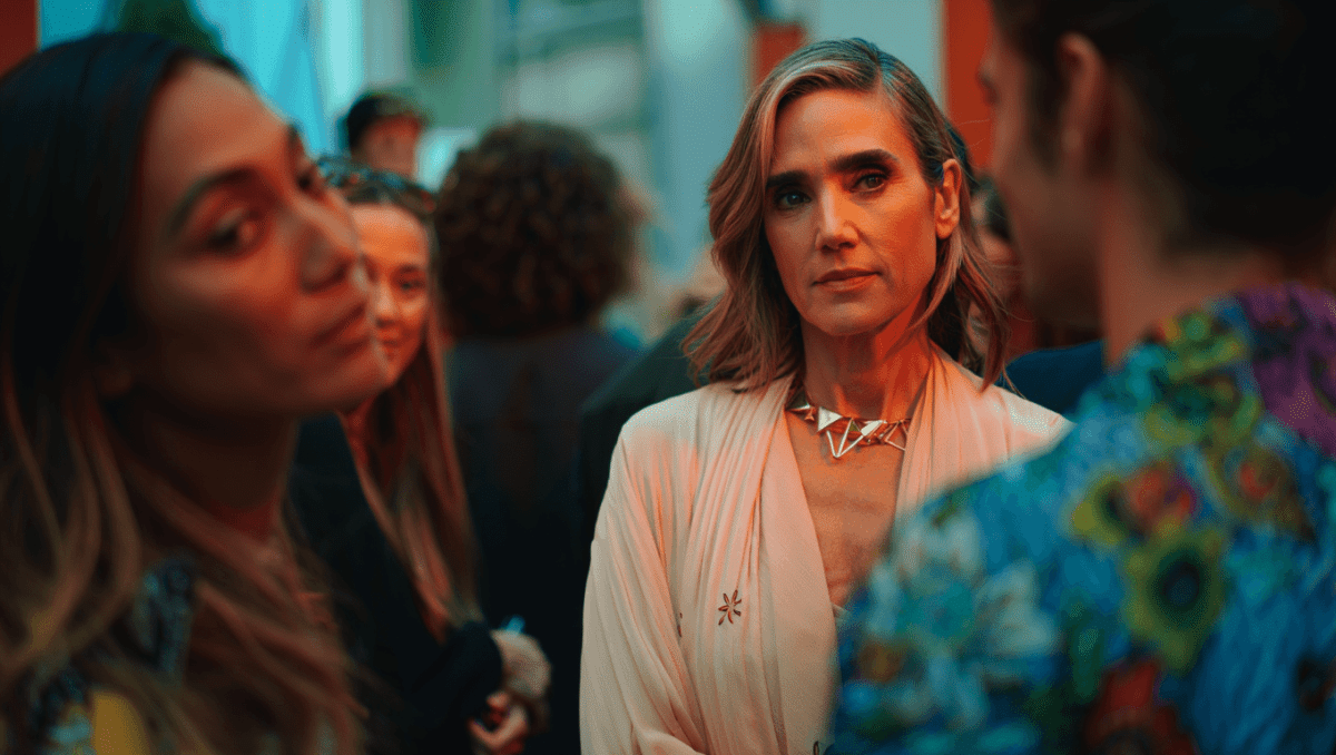 Jennifer Connelly brings airy luxury to Paris Fashion Week in draped Louis Vuitton jumpsuit