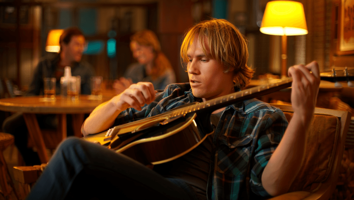 Adam Sanders appears on 'Marshals' in bar scene, sings 'His to Mine'