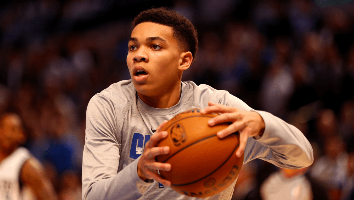Jamal Crawford gets bumped by Cooper Flagg during live broadcast warmups