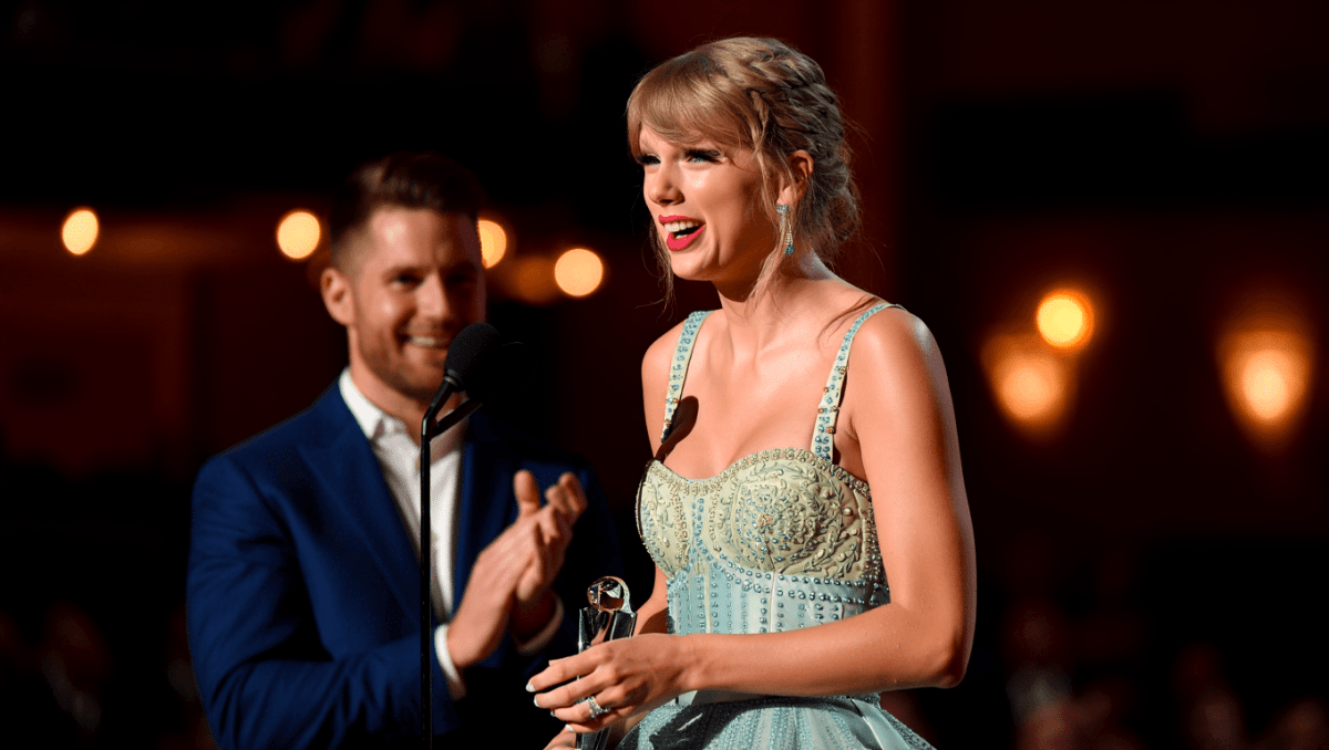 Travis Kelce arrives at iHeartRadio Music Awards with Taylor Swift