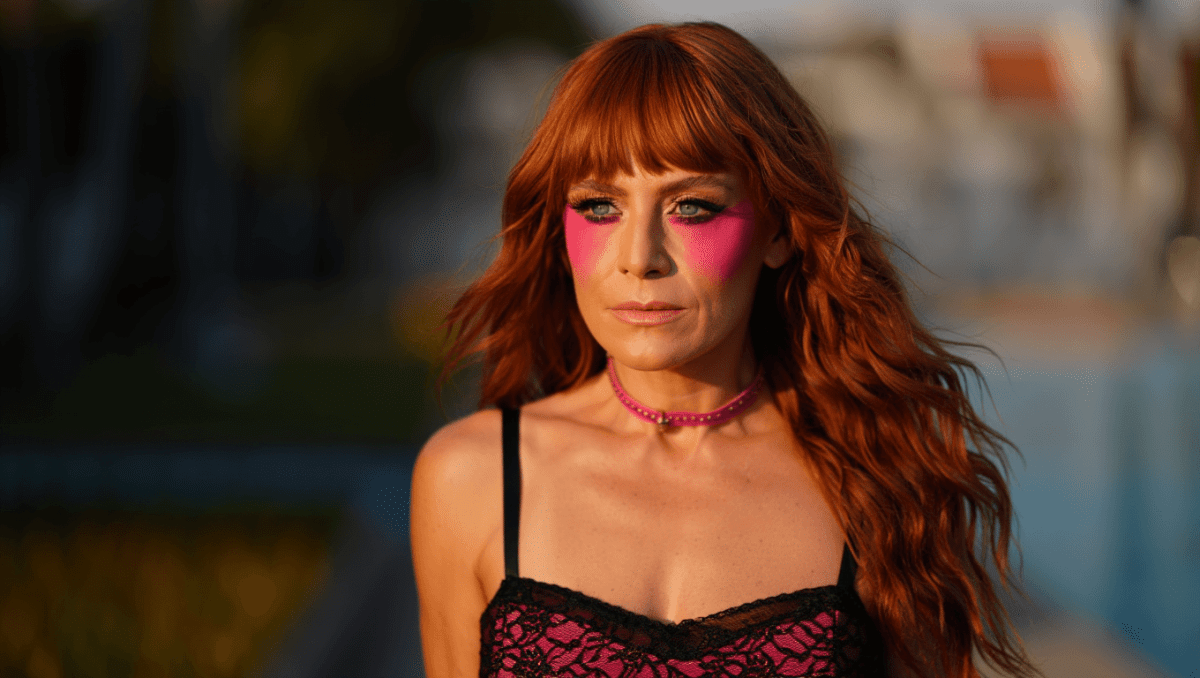 Margaret Qualley stars in Sabrina Carpenter's 'House Tour' music video with new auburn hair