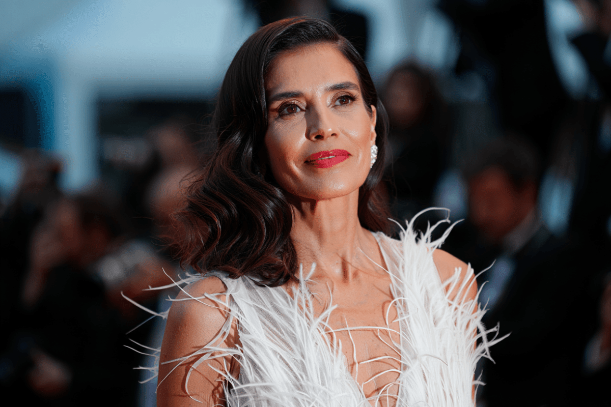 Aishwarya Rai closes Cannes 2026 in dramatic white feathered pantsuit designed by Cheney Chan
