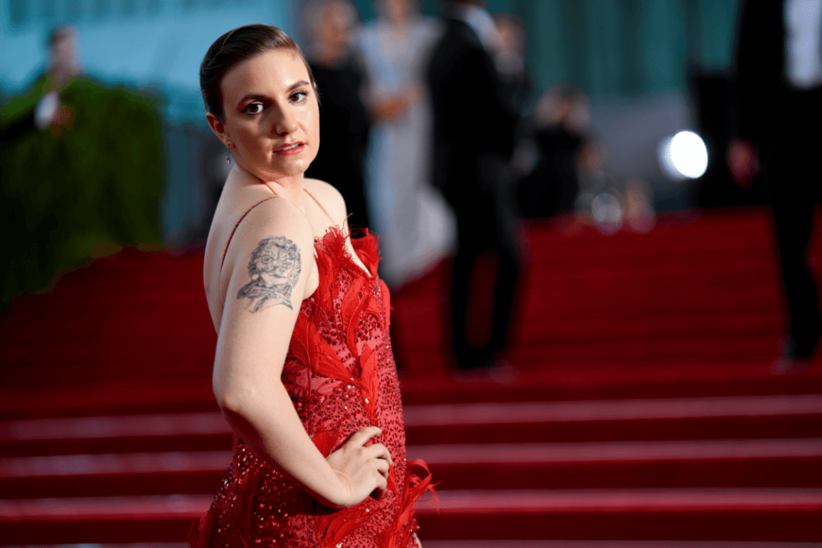 Lena Dunham returns to Met Gala as host committee member in red Valentino gown