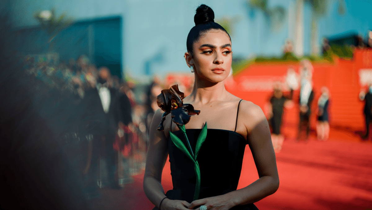 Charli XCX arrives at Met Gala in New York wearing Saint Laurent black gown with floral details