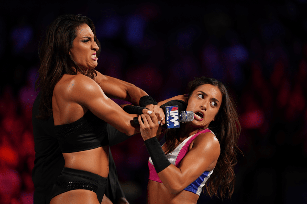 Nia Jax busts open Paige with microphone on SmackDown, requires stitches