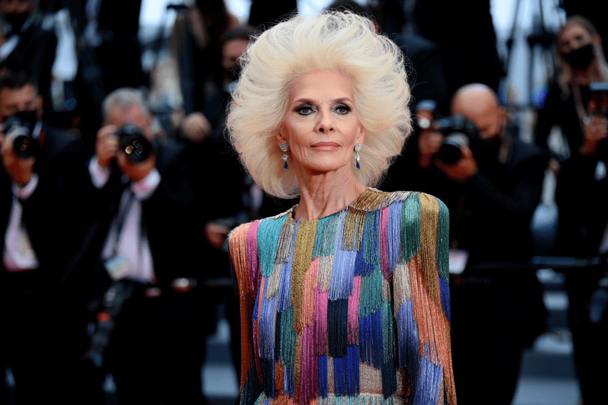 Lisa Rinna debuts dramatic platinum blonde look in Cannes with colorful Germanier gown