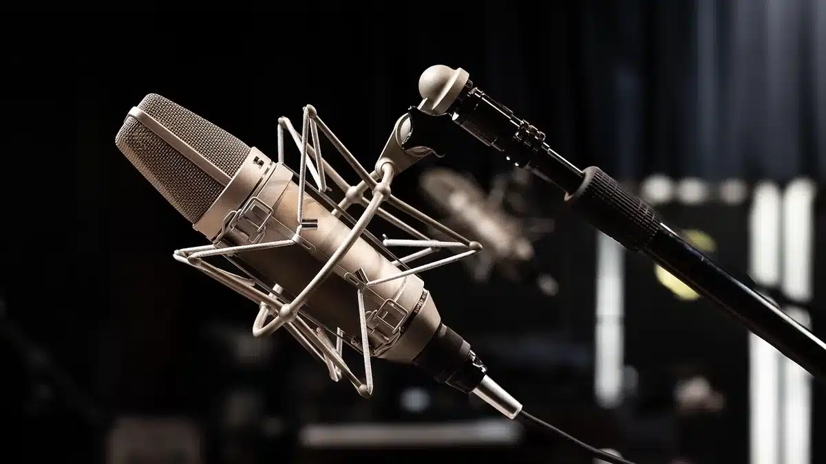 Musicians collaborating in a professional recording studio environment