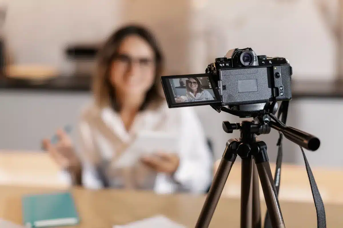 Creator filming personal content for a subscription platform on a mobile device