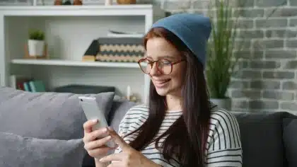Student with laptop and phone exploring streaming service discounts and tech offers