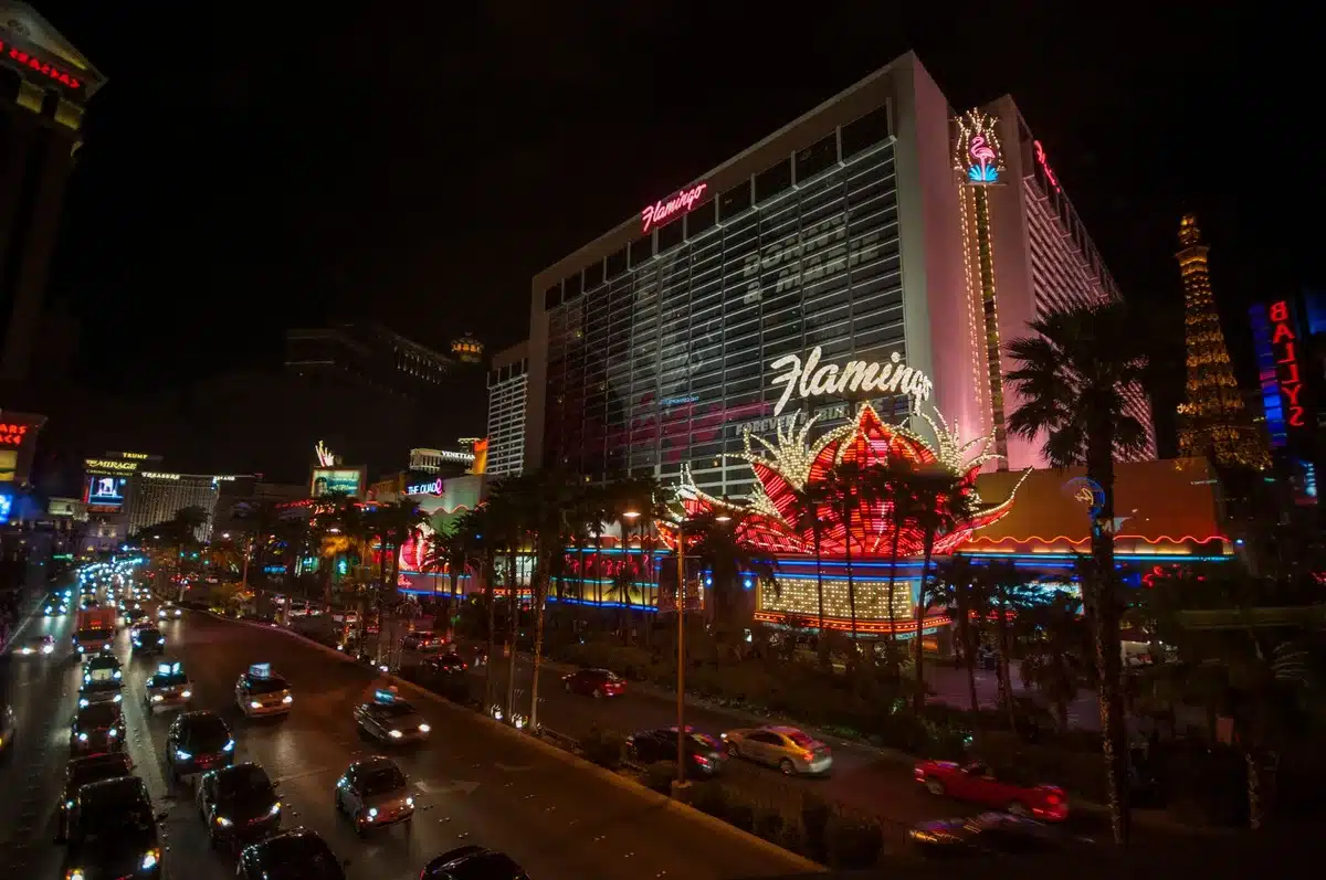 Las Vegas Strip at night with city lights and traffic, representing the location of the 1996 shooting