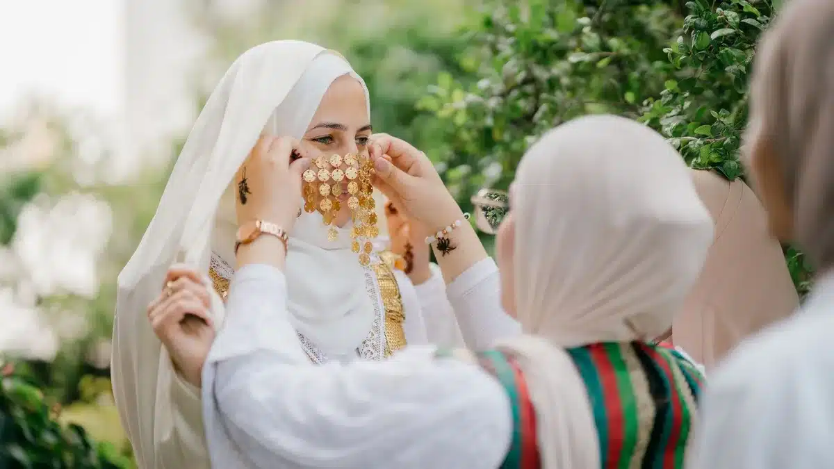 Family members sharing a casual moment together during wedding day preparations