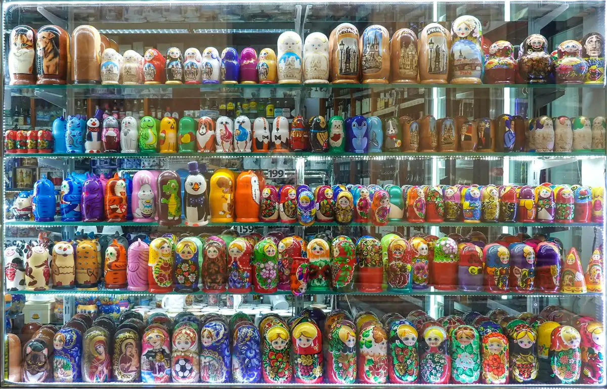 Collectible dolls displayed on retail shelves in store