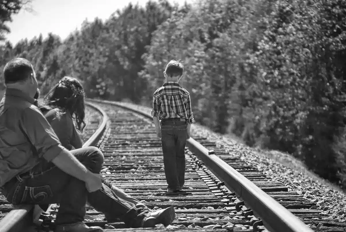 Candid family portrait from childhood showing supportive family members together