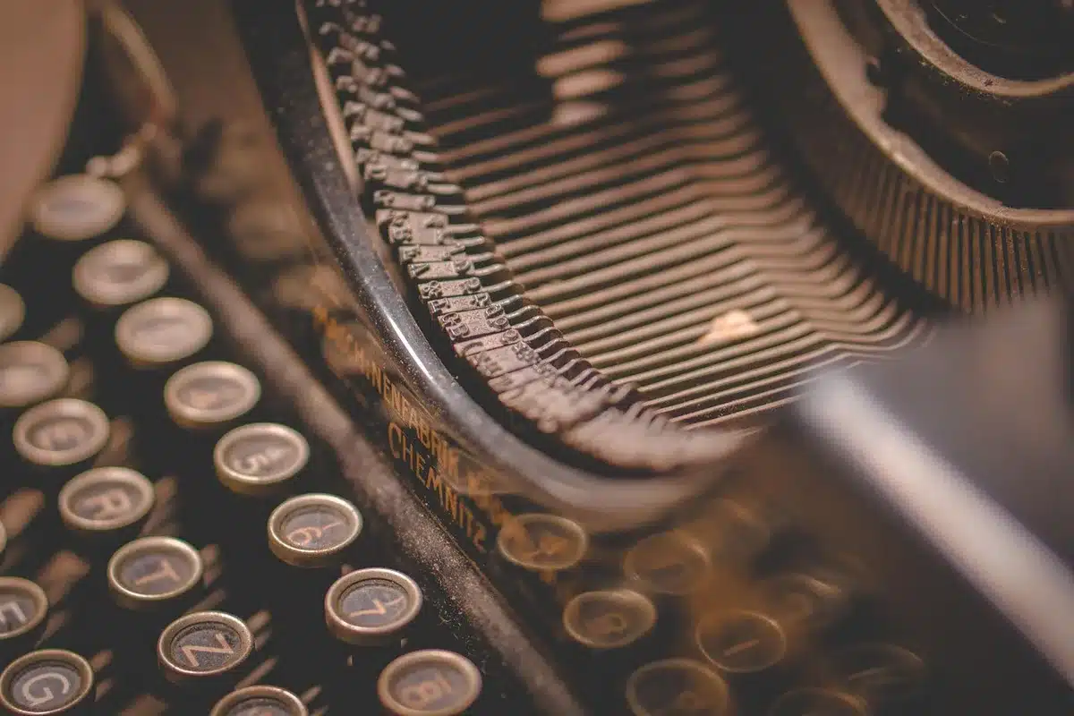 Journalist at newsroom desk verifying scientific sources and accessing peer-reviewed research