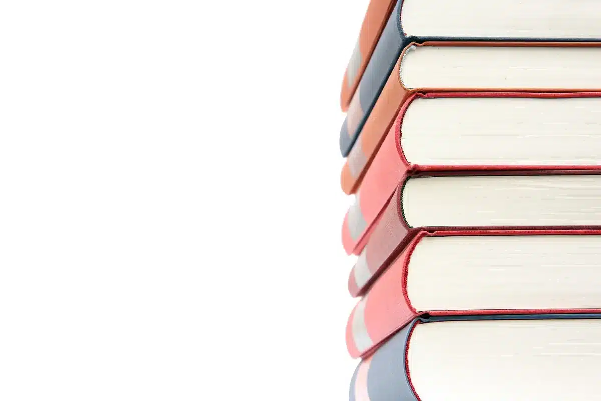 Stack of mythology books and a classroom survey sheet