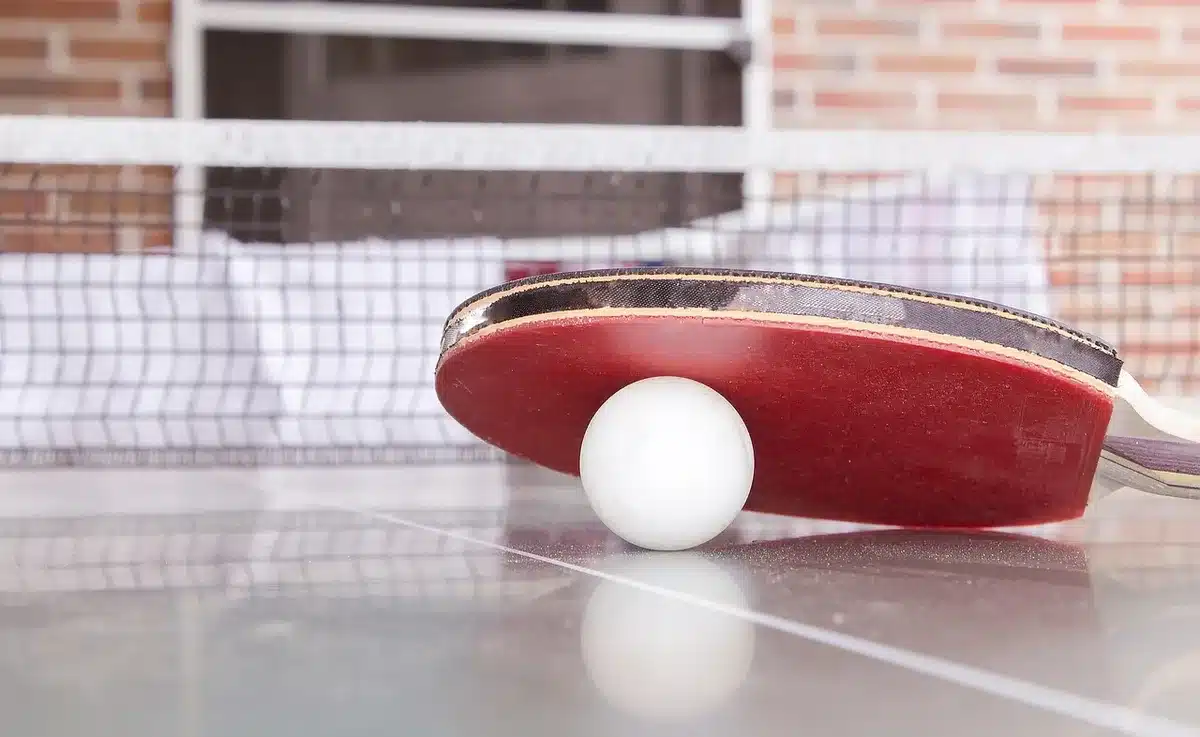 Assorted small objects on a table suggesting memory and storytelling
