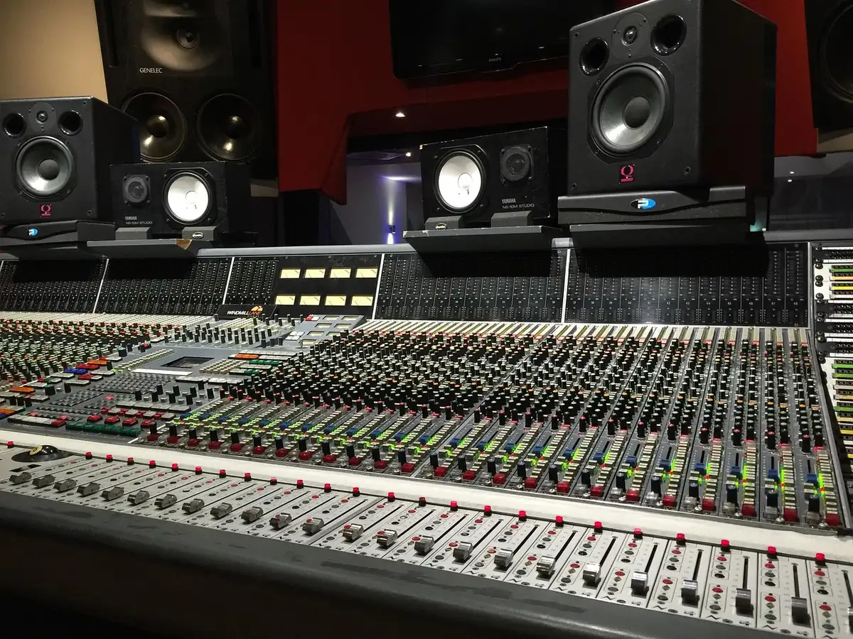 Vintage studio console and guitar amps inside a converted bunker