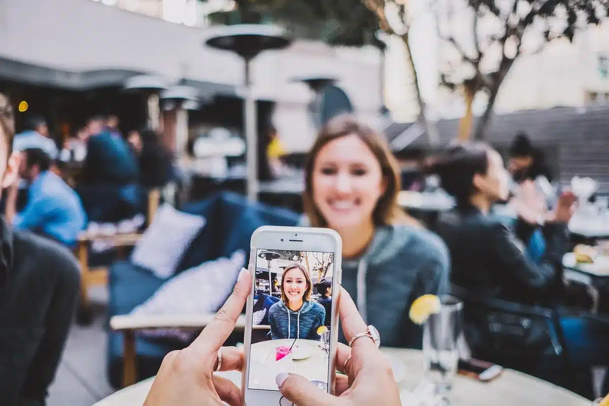 Person watching a viral TV clip on a smartphone
