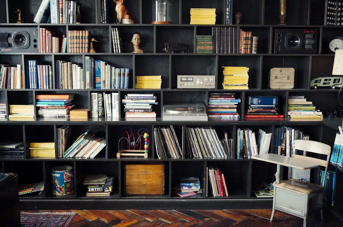 Stack of classic vinyl records representing legacy album records